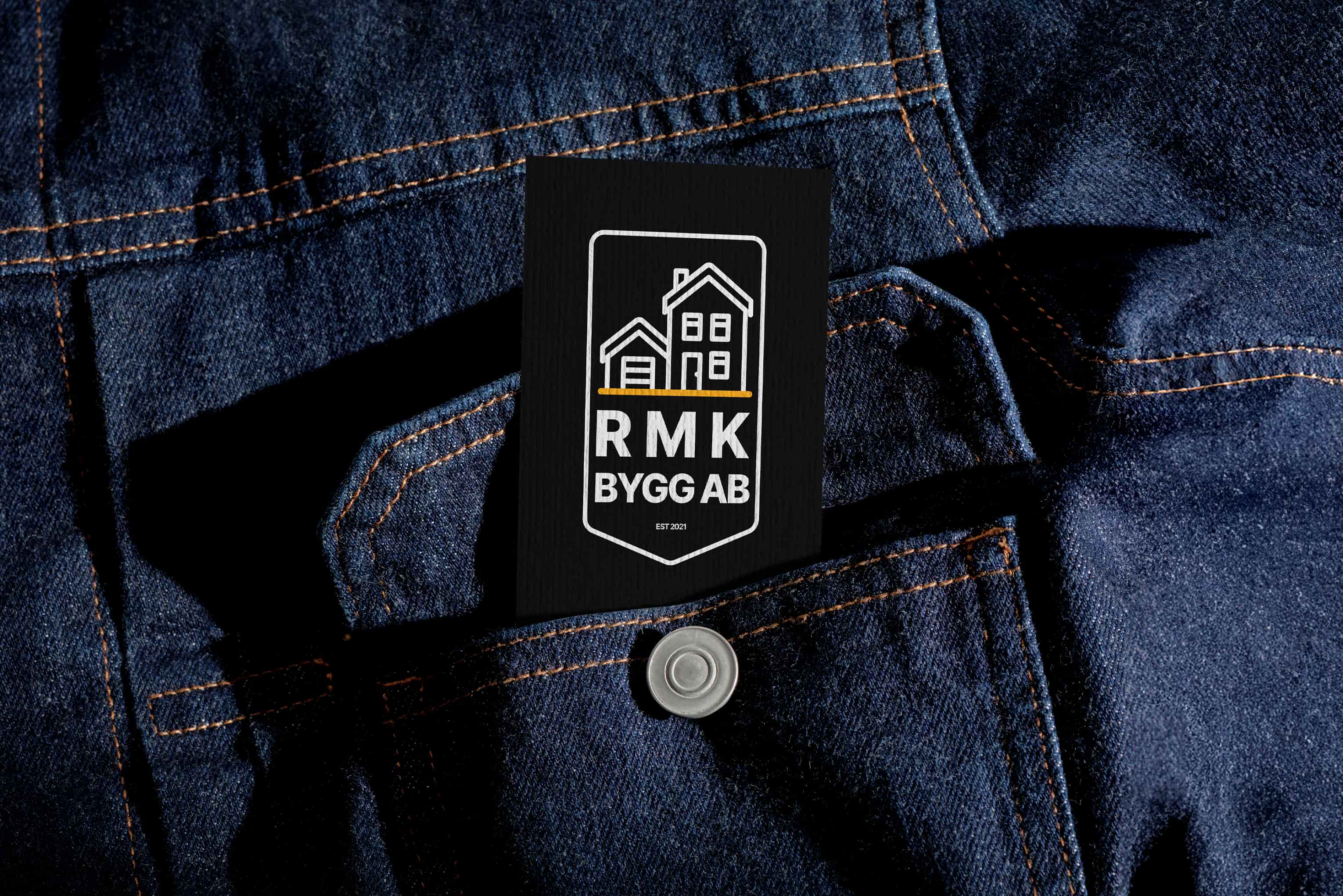 RMK Bygg's logo presented on workwear.