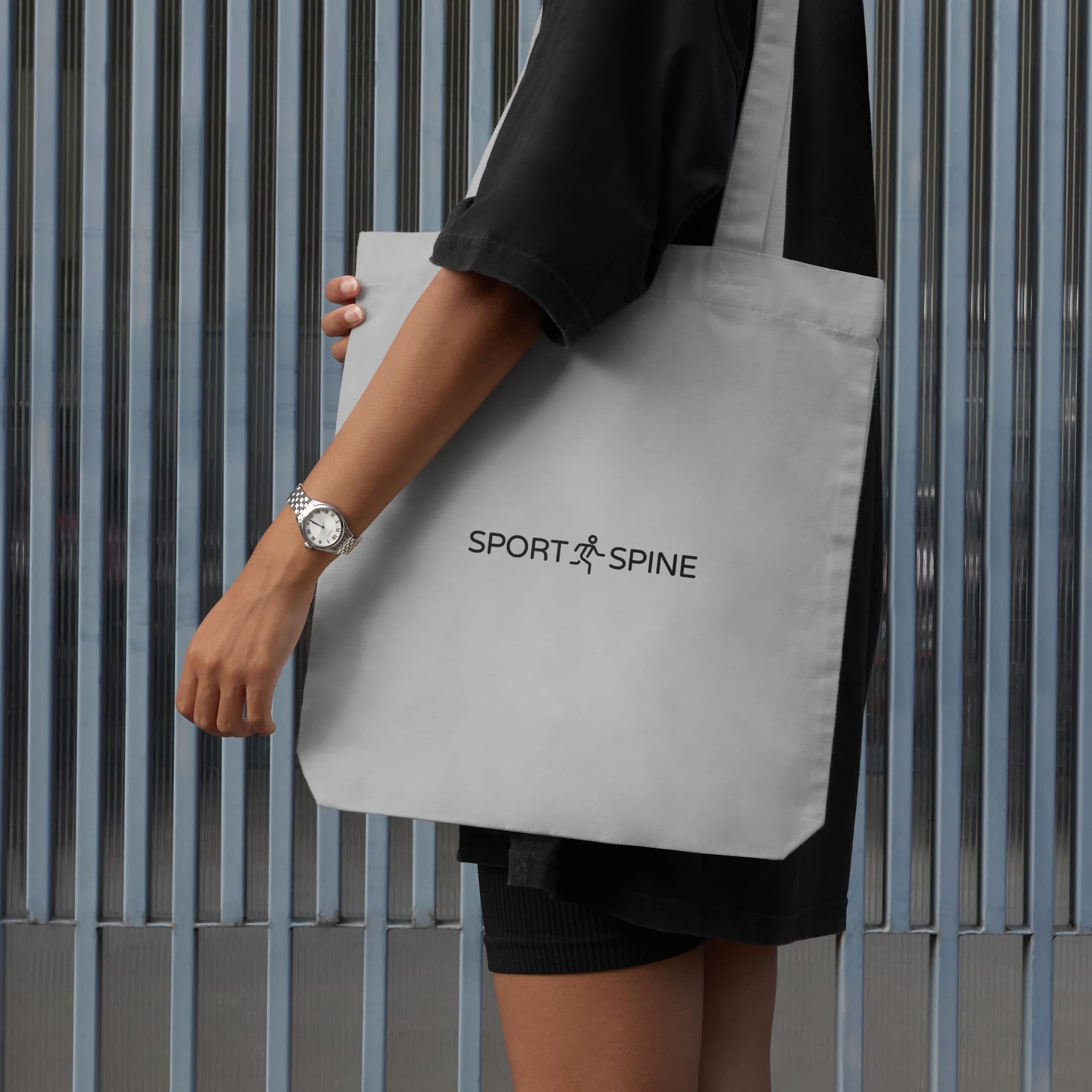 Tygkasse med Sport & Spines logotyp.